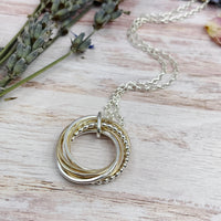 7 Ring Mixed Metals Necklace