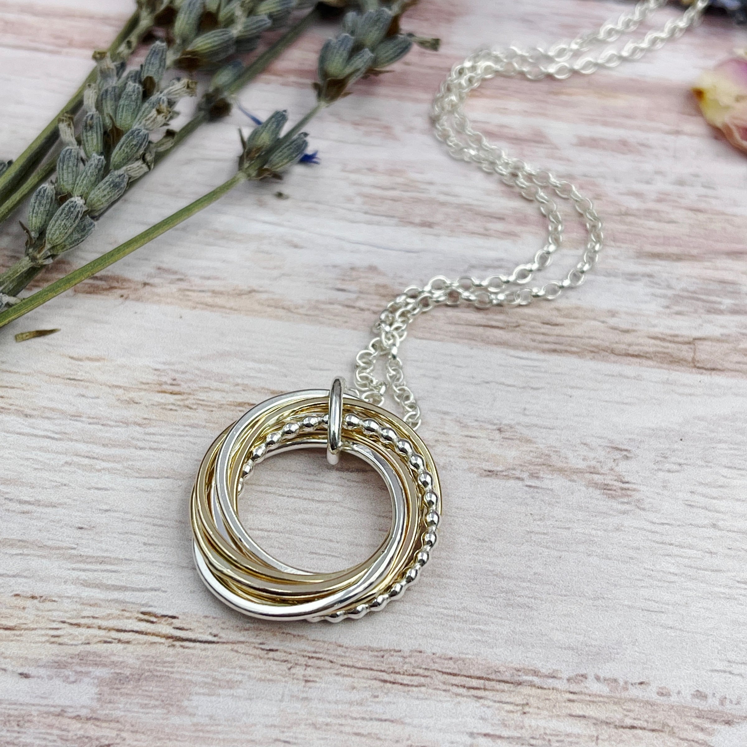 7 Ring Mixed Metals Necklace