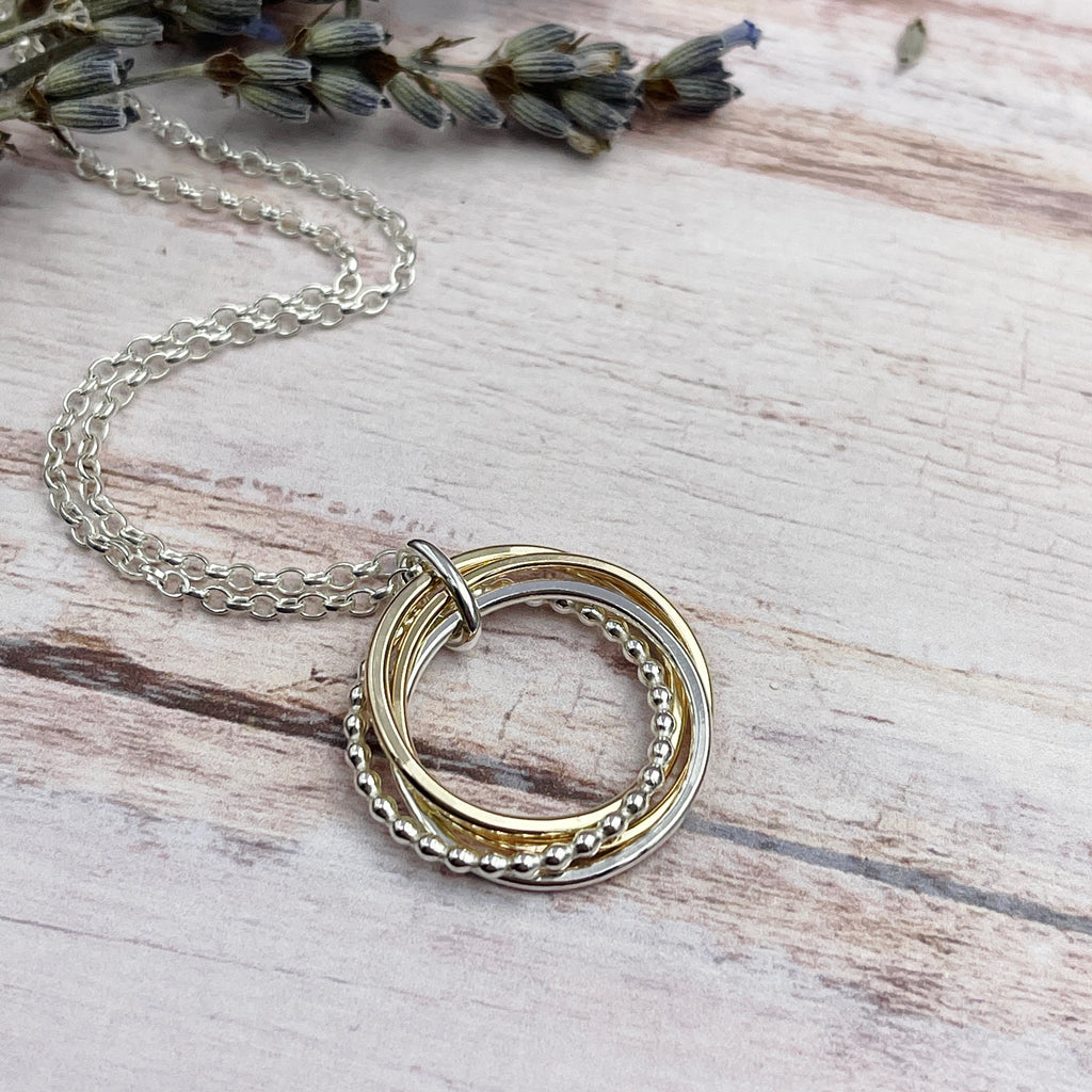 4 Ring Mixed Metals Necklace