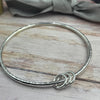 Sterling Silver Bangle with Silver Rings (3 to 9)