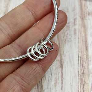 Sterling Silver Bangle with 4 Silver Rings