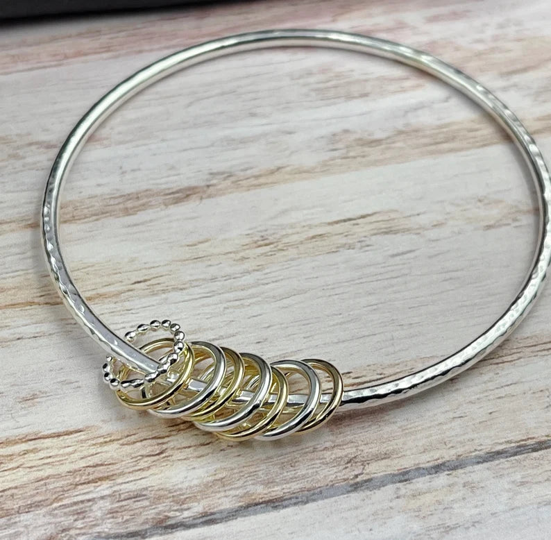 Sterling Bangle with 8 Mixed (Silver & Gold) Rings