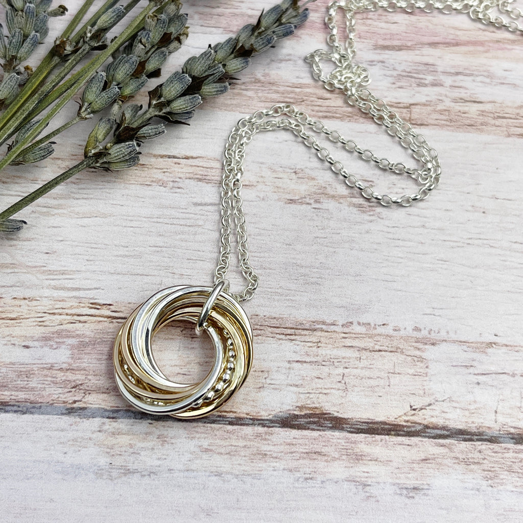 8 Petite Rings Mixed Metals Necklace