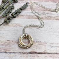 7 Petite Rings Mixed Metals Necklace