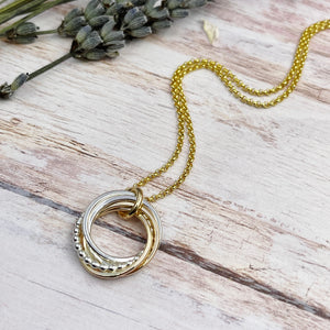 4 Petite Rings Mixed Metals Necklace