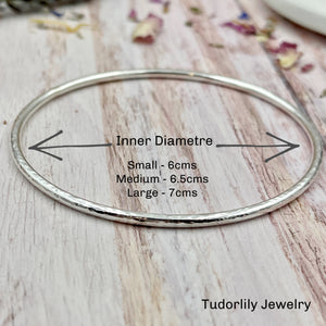 Sterling Silver Bangle with 7 Silver Rings