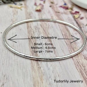 Sterling Silver Bangle with 4 Silver Rings