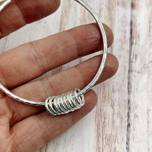 Sterling Silver Bangle with 9 Silver Rings