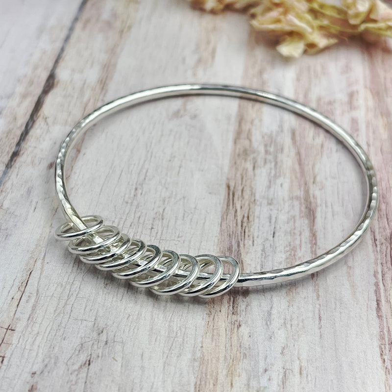 Sterling Silver Bangle with 9 Silver Rings